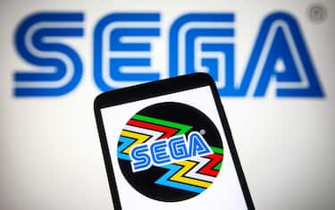UKRAINE - 2021/09/03: In this photo illustration a Sega logo is seen on a smartphone and a pc screen. (Photo Illustration by Pavlo Gonchar/SOPA Images/LightRocket via Getty Images)