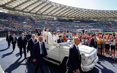 Pope Francis during a meeting for the World Children's Day at the Olimpico Stadium, Rome 25 May 2024. ANSA/FABIO FRUSTACI
