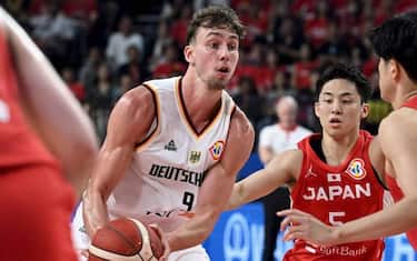 Franz Wagner of Germany (middle) and Yuki Kawamura of Japan during the 2023 FIBA Basketball World Championship group E match between Germany and Japan in Okinawa, 25th of August 2023. LEHTIKUVA / VESA MOILANEN - FINLAND OUT. NO THIRD PARTY SALES.  * Restriction for France customers: it is forbidden to publish on the day of the event-Restriction clients francais : il est interdit de publier le jour meme de l evenement. * //LEHTIKUVA_LKFTJK20230825154255KXWS_TUPP51BWW/Credit:Vesa Moilanen/LEHTIKUVA/SIPA/2308251514