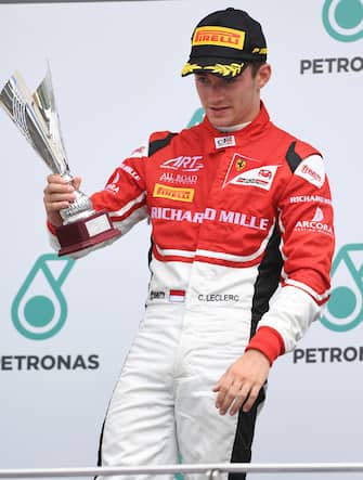 Third placed Charles Leclerc (MON) ART Grand Prix celebrates on the podium with the trophy at GP3 Series, Rd8, Sepang, Malaysia, 30 September - 2 October 2016.