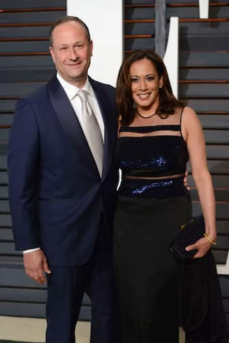 Kamala Harris (R) and her husband Douglas Emhoff attend the 2015 Vanity Fair Oscar viewing party at the Wallis Annenberg Center for the Performing Arts in Beverly Hills on February 22, 2015. (Photo by Chris DELMAS / AFP) (Photo by CHRIS DELMAS/AFP via Getty Images)