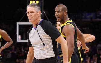 PHOENIX, ARIZONA - NOVEMBER 22: Chris Paul #3 of the Golden State Warriors reacts to referee Scott Foster #48 after being ejected for a second technical foul during the first half of the NBA game against the Phoenix Suns at Footprint Center on November 22, 2023 in Phoenix, Arizona. The Suns defeated the Warriors 123-115. NOTE TO USER: User expressly acknowledges and agrees that, by downloading and or using this photograph, User is consenting to the terms and conditions of the Getty Images License Agreement.  (Photo by Christian Petersen/Getty Images)
