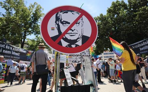 BUDAPEST, HUNGARY - JUNE 28: A banner shows Viktor Orban at the beginning of the Budapest Pride on June 28, 2025 in Budapest, Hungary. Early in 2025, Hungary passed a law restricting the freedom of assembly by connecting it to a previous law from 2021 prohibiting the public portrayal to children of 'divergence from self-identity corresponding to sex at birth, sex change or homosexuality'. Consequently, events such as Pride marches are illegal in the country. The LGBTQ+ community are defying the ban and holding their Pride event on the streets of Budapest. (Photo by Janos Kummer/Getty Images)