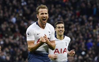 epa07252941 Tottenham Hotspur's Harry Kane (L) celebrates scoring a goal during the English Premier League soccer match between Tottenham Hotspur and Wolverhampton Wanderers at Wembley Stadium in London, Britain, 29 December 2018.  EPA/NEIL HALL EDITORIAL USE ONLY. No use with unauthorized audio, video, data, fixture lists, club/league logos or 'live' services. Online in-match use limited to 120 images, no video emulation. No use in betting, games or single club/league/player publications.