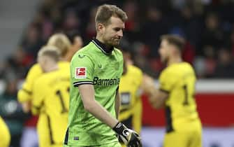 epa11009459 Leverkusen's goalkeeper Lukas Hradecky reacts during the German Bundesliga soccer match between Bayer 04 Leverkusen and Borussia Dortmund in Leverkusen, Germany, 03 December 2023.  EPA/CHRISTOPHER NEUNDORF CONDITIONS - ATTENTION: The DFL regulations prohibit any use of photographs as image sequences and/or quasi-video.