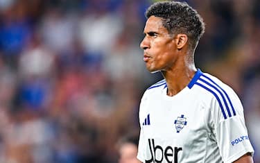 GENOA, ITALY - AUGUST 11: Raphaël Varane of Como looks on during the Coppa Italia match between UC Sampdoria and Como at Stadio Luigi Ferraris on August 11, 2024 in Genoa, Italy. (Photo by Simone Arveda/Getty Images)