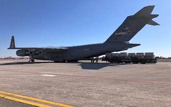 UNSPECIFIED, UNSPECIFIED - MARCH 2020: In this handout image provided the U.S Air Force dated March 16-17, the U.S. Air Forceâ  s Air Mobility Command transported a shipment of 13 pallets containing 500,000 COVID-19 testing swabs aboard a C-17 Globemaster III from Aviano Air Base, Italy, to Memphis Air National Guard Base, Tennessee. (Photo by U.S Air Force via Getty Images)
