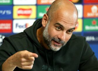 epa10675986 Manchester City manager Pep Guardiola gestures during a press conference on the UEFA Champions League media day at the City Football Academy in Manchester, Britain, 06 June 2023. Manchester City will play Inter Milan in the UEFA Champions League final at the Ataturk Olympic Stadium in Istanbul on 10 June 2023.  EPA/ADAM VAUGHAN