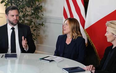 Italy's Prime Minister, Giorgia Meloni (C) meets with European Commission President Ursula von der Leyen and US Vice President JD Vance at Palazzo Chigi in Rome on May 18, 2025. (Photo by Jacquelyn Martin / POOL / AFP)