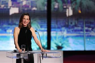 CANNES, FRANCE - MAY 14: Mistress of ceremonies Camille Cottin speaks on stage during the opening ceremony at the 77th annual Cannes Film Festival at Palais des Festivals on May 14, 2024 in Cannes, France. (Photo by Andreas Rentz/Getty Images)