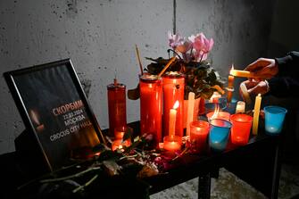 epa11239647 People light candles as they participate in a protest in solidarity with the Russian people and the families of those killed in the attack in Moscow on 22 March, outside of the Russian embassy in Beirut, Lebanon, 23 March 2024. On 22 March, a group of gunmen attacked the Crocus City Hall in the Moscow region, Russian emergency services said. According to the latest data from the Russian Investigative Committee, 133 people died and more than 100 were hospitalized. On the morning of 23 March, the director of the Russian FSB, Alexander Bortnikov, reported to Russian President Vladimir Putin about the detention of 11 people, including all four terrorists directly involved in the terrorist attack.  EPA/WAEL HAMZEH