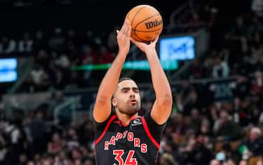 TORONTO, ON - FEBRUARY 9: Jontay Porter #34 of the Toronto Raptors shoots against the Houston Rockets during the first half of their basketball game at the Scotiabank Arena on February 9, 2024 in Toronto, Ontario, Canada. NOTE TO USER: User expressly acknowledges and agrees that, by downloading and/or using this Photograph, user is consenting to the terms and conditions of the Getty Images License Agreement. (Photo by Mark Blinch/Getty Images)