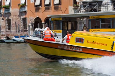 Venice, Italy, A ambulance with medical personnel aboard powers its way at high speed down the Grand Canal. (Photo by: Education Images/Universal Images Group via Getty Images)