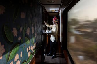 butler in the suite hall. Maharajas express luxury train. Rajasthan. India