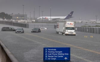 epa10571675 Several cars are stuck in flood water on Fort Lauderdale International Airport's West Perimeter road in Fort Lauderdale, Florida, USA, 13 April 2023. Heavy rains in the past days produced flooding in the lower areas of the Miami-Dade and Broward counties.  EPA/CRISTOBAL HERRERA-ULASHKEVICH