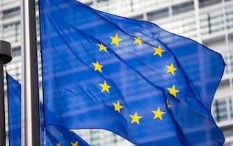 EU flag in front of Berlaymont building facade
