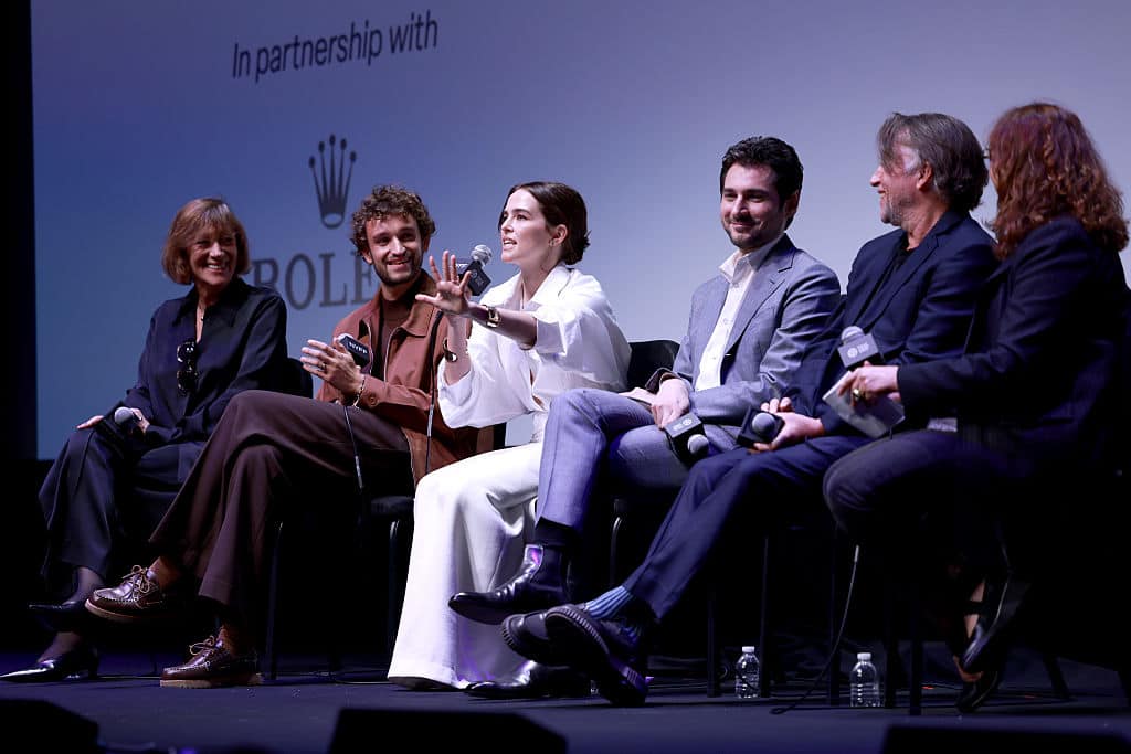 NEW YORK, NEW YORK - SEPTEMBER 30: (L-R) MichÃ¨le PÃ©tin, Aubry Dullin, Zoey Deutch, Guillaume Marbeck, Richard Linklater, and Florence Almozin speak onstage during Netflix's "Nouvelle Vague" NYFF Spotlight Premiere and Q&A at Alice Tully Hall on September 30, 2025 in New York City. (Photo by Jason Mendez/Getty Images for Netflix)