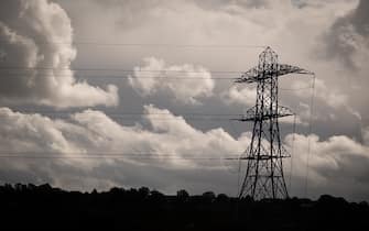 BRISTOL, UNITED KINGDOM - SEPTEMBER 17: Electrical pylons carry electricity cables across fields on September 17, 2023 near Bristol, England. The National Grid is seen as critical infrastructure to help the UK hit hit net zero carbon ambitions. (Photo by Matt Cardy/Getty Images)