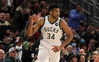 MILWAUKEE, WISCONSIN - FEBRUARY 15: Giannis Antetokounmpo #34 of the Milwaukee Bucks reacts to a three point shot during the second half of a game against the Indiana Pacers at Fiserv Forum on February 15, 2022 in Milwaukee, Wisconsin. NOTE TO USER: User expressly acknowledges and agrees that, by downloading and or using this photograph, User is consenting to the terms and conditions of the Getty Images License Agreement. (Photo by Stacy Revere/Getty Images)