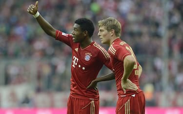 Bayern Munich's Austrian midfielder David Alaba (L) and Bayern Munich's midfielder Toni Kroos (R) speak during the German first division Bundesliga match between FC Bayern Munich and Eintracht Frankfurt in the stadium in Munich, southern Germany, on November 10, 2012. Munich won the match 2-0. AFP PHOTO/CHRISTOF STACHE

RESTRICTIONS / EMBARGO - DFL RULES TO LIMIT THE ONLINE USAGE DURING MATCH TIME TO 15 PICTURES PER MATCH. IMAGE SEQUENCES TO SIMULATE VIDEO IS NOT ALLOWED AT ANY TIME. FOR FURTHER QUERIES PLEASE CONTACT DFL DIRECTLY AT + 49 69 650050        (Photo credit should read CHRISTOF STACHE/AFP via Getty Images)