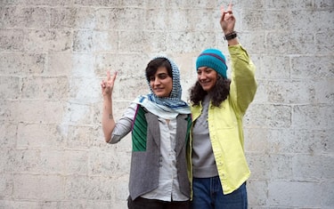 epa11076186 A handout photo made available by the Shargh News Daily online shows Iranian journalists Niloufar Hamedi (R) and Elaheh Mohammadi (L) after being released from prison in Tehran, Iran, 14 January 2024. According to state-run IRNA news agency, Niloufar Hamedi and Elaheh Mohammadi, who were arrested in September 2022 following the death of Mahsa Amini, were released on bail on 14 January 2024.  EPA/SHARGH NEWS DAILY ONLINE/SAHAND TAKI/HANDOUT  HANDOUT EDITORIAL USE ONLY/NO SALES HANDOUT EDITORIAL USE ONLY/NO SALES