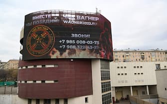 An advertising screen promoting private mercenary group Wagner sits on a building in Moscow on April 17, 2023. - The slogan reads "Together we will win!". (Photo by NATALIA KOLESNIKOVA / AFP) (Photo by NATALIA KOLESNIKOVA/AFP via Getty Images)