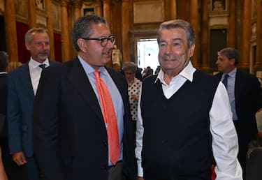 Il presidente della regione Liguria Giovanni Toti (S) e l'imprenditore Aldo Spinelli, in una foto d'archivio. Genova, 07 maggio 2024.
ANSA/LUCA ZENNARO 