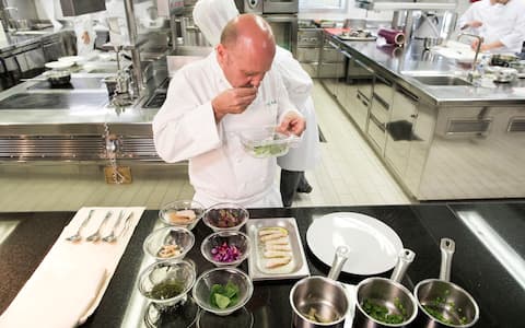 ROME, ITALY - MAY 23: A three-Michelin starred chef German-born Heinz Beck sniffs aromatic herbs for a special salad at the of Waldorf Astoria Hotel Cavalieri restaurant 'La Pergola' on May 23, 2019 in Rome, Italy. (Photo by Franco Origlia/Getty Images)
