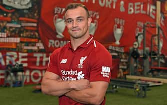 LIVERPOOL, ENGLAND - JULY 13:  (THE SUN OUT. THE SUN ON SUNDAY OUT)  Xherdan Shaqiri signs for Liverpool at Melwood Training Ground on July 13, 2018 in Liverpool, England.  (Photo by John Powell/Liverpool FC via Getty Images)