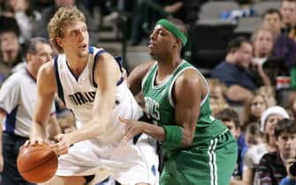 DALLAS - DECEMBER 10:  Dirk Nowitzki #41 of the Dallas Mavericks is defended by Paul Pierce #34 of the Boston Celtics during the game at American Airlines Arena on December 10, 2005 in Dallas, Texas.  The Mavericks won 103-94.  NOTE TO USER: User expressly acknowledges and agrees that, by downloading and/or using this Photograph, user is consenting to the terms and conditions of the Getty Images License Agreement. Mandatory Copyright Notice: Copyright 2005 NBAE  (Photo by Glenn James/NBAE via Getty Images)