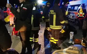 Emergency personnel attend to victims of a stampede at a nightclub in Corinaldo, near Ancona, central Italy, 08 December 2018. A stampede outside a nightclub has killed six people and injured more than 100, after someone probably caused a panic with a stinging spray The incident took place at a packed club hosting a concert by popular Italian rapper Sfera Ebbasta. ANSA/ ITALIAN FIRE DEPARTMENT   +++ HO - NO SALES, EDITORIAL USE ONLY +++