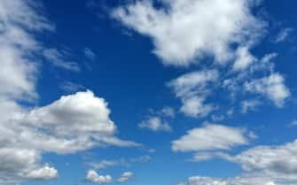 Fluffy clouds on blue sky