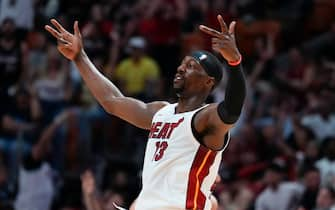 MIAMI, FLORIDA - APRIL 19: Bam Adebayo #13 of the Miami Heat celebrates scoring a three-pointer against the Chicago Bulls in the third quarter during the Play-In Tournament at Kaseya Center on April 19, 2024 in Miami, Florida. NOTE TO USER: User expressly acknowledges and agrees that, by downloading and or using this photograph, User is consenting to the terms and conditions of the Getty Images License Agreement. (Photo by Rich Storry/Getty Images)