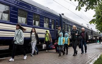 POKROVSK, UKRAINE - MAY 01: People walk to a train in the direction of Lviv, at railway station in Pokrovsk, Ukraine on May 01, 2023. (Photo by Diego Herrera Carcedo/Anadolu Agency via Getty Images)