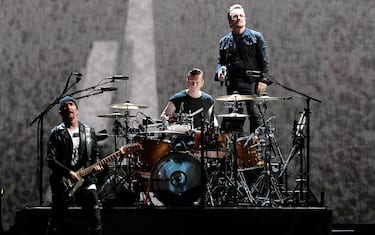 LANDOVER, MD - JUNE 20:  (L to R) The Edge, Larry Mullen Jr., and Bono of U2 perform during the 'Joshua Tree Tour 2017' at FedExField on June 20, 2017 in Landover, Maryland.  (Photo by Paul Morigi/Getty Images)