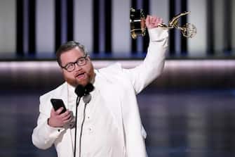 Jan 15, 2024; Los Angeles, CA, USA; Paul Walter Hauser accepts the award for outstanding supporting actor in a limited or anthology series or movie during the 75th Emmy Awards at the Peacock Theater in Los Angeles on Monday, Jan. 15, 2024. Mandatory Credit: Robert Hanashiro-USA TODAY/Sipa USA
