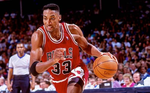 PORTLAND, OR - CIRCA 1994: Scottie Pippen #33 of the Chicago Bulls dribbles against the Portland Trailblazers circa 1994 at the Veterans Memorial Coliseum in Portland, Oregon. NOTE TO USER: User expressly acknowledges and agrees that, by downloading and or using this photograph, User is consenting to the terms and conditions of the Getty Images License Agreement. Mandatory Copyright Notice: Copyright 1994 NBAE (Photo by Brian Drake/NBAE via Getty Images)