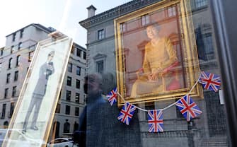 epa10608892 An art gallery displays Royal portraits in London, Britain, 04 May 2023. Britain's King Charles III's Coronation takes place at Westminster Abbey in London on 06 May 2023.  EPA/CATHAL MCNAUGHTON