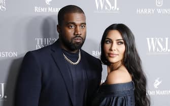 epa07977720 US rapper Kayne West (L) and his wife Television personality Kim Kardashian West (R) pose for a photo at the WSJ Mag 2019 Innovator Awards at The Museum of Modern Art in New York, New York, USA, 06 November 2019.  EPA/JASON SZENES