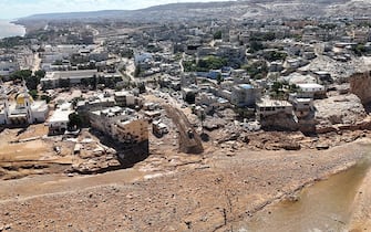 DERNA, LIBYA - SEPTEMBER 13: An aerial view of the devastation in disaster zones after the floods caused by the Storm Daniel ravaged the region in Derna, Libya on September 13, 2023. The death toll from devastating floods in Libya's eastern city of Derna has risen to 6.000 and thousands of people are still missing, as the Government of National Unity in Libya announced. (Photo by Muhammad J. Elalwany/Anadolu Agency via Getty Images)