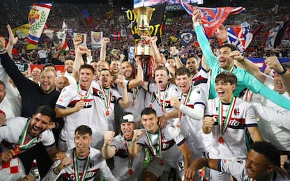 Players of Bologna celebrate the victory at the end of the Italian Cup final soccer match between AC Milan and Bologna FC at Olimpico Stadium in Rome, Italy, 14 May 2025. ANSA/FEDERICO PROIETTI
