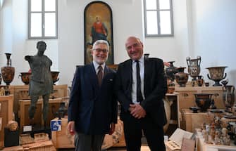 Italian national anti-mafia and anti-terrorism prosecutor, Giovanni Melillo (L), and Marseille prosecutor Nicolas Besson (R), during the presentation to journalists of some 600 stolen works of art that where gave back by the United States of America to the Italian Carabinieri Command for the Protection of Cultural Heritage, in Rome, Italy, 28 May 2024. ANSA/ETTORE FERRARI

