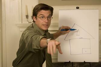 Gary and Brooke's realtor Riggleman (JASON BATEMAN) leads an aggressive game of Pictionary in the romantic comedy THE BREAK-UP.