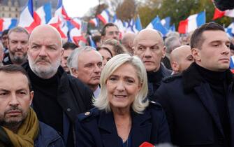 French far-right party Rassemblement National (RN) member of Parliament Marine Le Pen (C), President of French far-right party Rassemblement National (RN) Jordan Bardella (R) and French Far-right Rassemblement National (RN) party's MP Sebastien Chenu (L) march during a demonstration against anti-Semitism in Paris, on November 12, 2023. Tens of thousands are expected to march Sunday in Paris against anti-Semitism amid bickering by political parties over who should take part and a surge in anti-Semitic incidents across France. Tensions have been rising in the French capital, home to large Jewish and Muslim communities, in the wake of the October 7 attack by Palestinian militant group Hamas on Israel, followed by a month of Israeli bombardment of the Gaza Strip. France has recorded nearly 12,250 anti-Semitic acts since the attack. National Assembly speaker Yael Braun-Pivet and Gerard Larcher, the Senate speaker, called on November 7 for a "general mobilisation" at the march against the upsurge in anti-Semitism. (Photo by Geoffroy Van der Hasselt / AFP) (Photo by GEOFFROY VAN DER HASSELT/AFP via Getty Images)