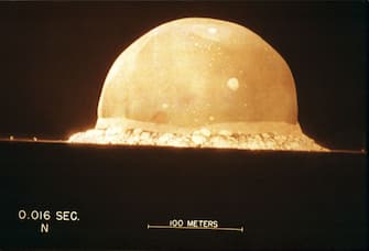 A photograph on display at The Bradbury Science Museum shows the first atomic bomb test On July 16, 1945, at 5:29:45am, at Trinity Site in New Mexico, U.S.A. The museum is Los Alamos National Laboratory's window to the public. The Museum displays the Laboratory's current research and presents the history of the Laboratory's role in the Manhattan Project during World War II. (photograph on display in the Bradbury Science museum, photo copied by Joe Raedle)