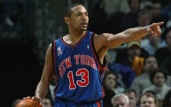 MILWAUKEE - JANUARY 26:  Point guard Mark Jackson #13 of the New York Knicks dribbles the ball during the NBA game against the Milwaukee Bucks at Bradley Center in Milwaukee, Wisconsin on January 26, 2002.  The Knicks won in double overtime 129-127.  NOTE TO USER: User expressly acknowledges and agrees that, by downloading and/or using this Photograph, User is consenting to the terms and conditions of the Getty Images License Agreement Mandatory Copyright Notice:  Copyright 2002 NBAE  (Photo by Gary Dineen/NBAE via Getty Images) 