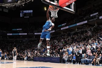 MINNEAPOLIS, MN -  FEBRUARY 27: Anthony Edwards #5 of the Minnesota Timberwolves dunks the ball during the game against the San Antonio Spurs on February 27, 2024 at Target Center in Minneapolis, Minnesota. NOTE TO USER: User expressly acknowledges and agrees that, by downloading and or using this Photograph, user is consenting to the terms and conditions of the Getty Images License Agreement. Mandatory Copyright Notice: Copyright 2024 NBAE (Photo by David Sherman/NBAE via Getty Images)