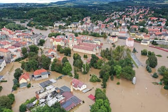 epa11606210 An aerial picture taken with a drone shows flooded Klodzko, southwestern Poland, 15 September 2024. The southern regions of Poland are experiencing record rainfall and severe flooding caused by heavy rains from the Genoese depression "Boris", which reached Poland on Thursday, September 12. People in flooded areas of the region are being forced to evacuate, and water is flooding villages and towns. River levels are at or above alarming levels. Poland's prime minister confirmed on September 15 that one person had died as a result of the flooding.  EPA/MACIEJ KULCZYNSKI POLAND OUT