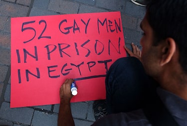 393266 01:  A demonstrator makes a sign August 15, 2001 in New York City to show support for the 52 allegedly gay men who are under arrest in Cairo, Egypt. The men, who have been detained for over two months, are being held on charges of obscene behavior. The activists believe the men are being detained because of their sexual orientation. (Photo by Spencer Platt/Getty Images)