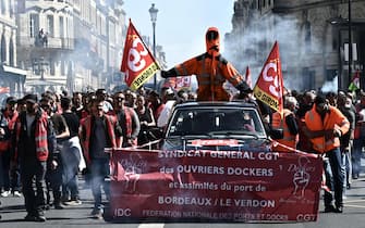 Demonstrators take part in the 11th day of action after the government pushed a pensions reform through parliament without a vote, using the article 49.3 of the constitution, in Bordeaux, southwestern France, on April 6, 2023. - France on April 6, 2023 braced for another day of protests and strikes to denounce French President's pension reform one day after talks between the government and unions ended in deadlock. (Photo by Philippe LOPEZ / AFP)